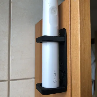 Giá đỡ bàn chải điện hình chim cánh cụt