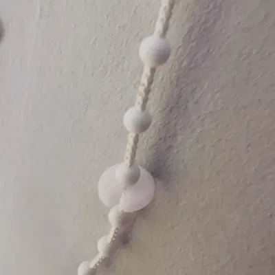 Cái chặn dây cho rèm cuốn tự động