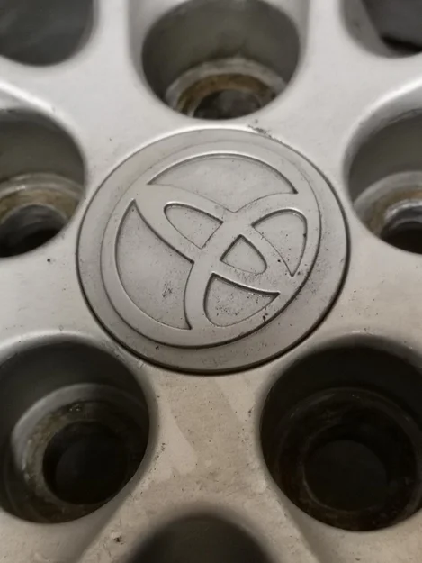 Nắp bánh xe 57mm với logo Toyota và lò xo thay thế - Image 6