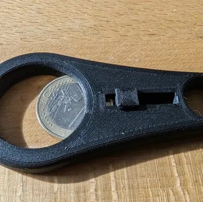 Mở nắp chai và giữ tiền xu xe đẩy trên móc khóa