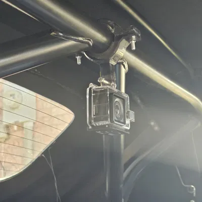 Kẹp camera hành động cho thanh cuộn Hard Dog trong Miata