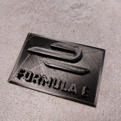 Biểu tượng đua xe công thức E in màu đen trắng