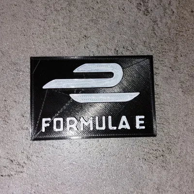 Biểu tượng đua xe công thức E in màu đen trắng