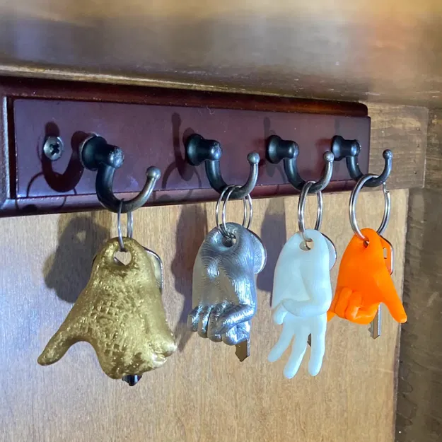 Móc chìa khóa hình tay nhỏ tiện lợi cho việc tìm kiếm chìa khóa - Image 1