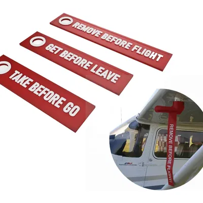 Móc khóa nhắc nhở 'Gỡ trước khi bay