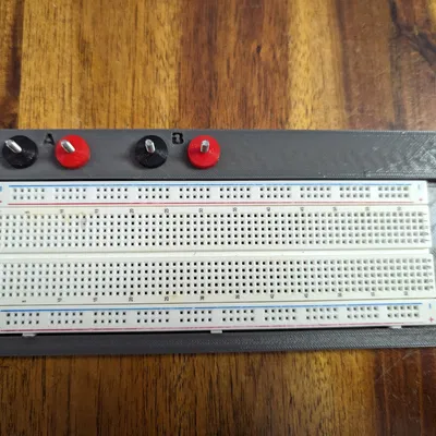 Giá đỡ breadboard với đầu nối nguồn và mặt đất chung