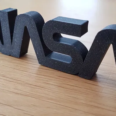 Chữ NASA khối 3D màu đen trên nền trắng