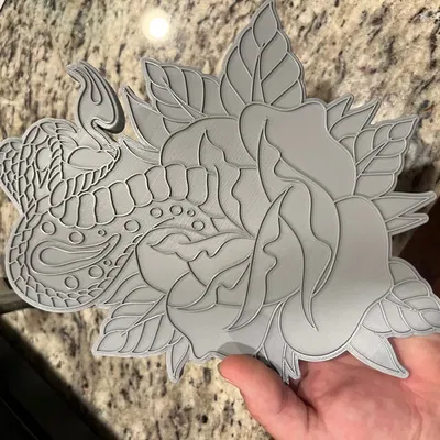 Hình xăm truyền thống rắn và hoa hồng phong cách Mỹ