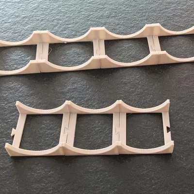 Giá đỡ chai nước ngọt chống lăn