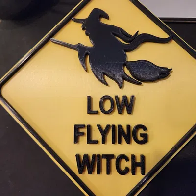 Biển báo phù thủy bay thấp cho trang trí Halloween