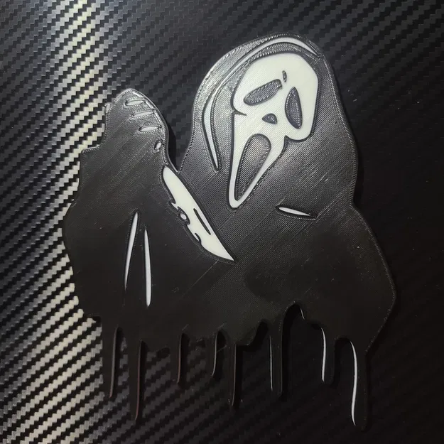 Biểu tượng mặt ma với con dao sắc nét - Image 1