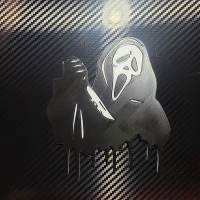 Biểu tượng mặt ma với con dao sắc nét