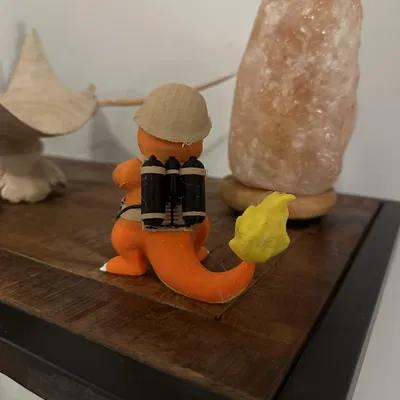 Charmander sử dụng súng phun lửa trong nghệ thuật điêu khắc