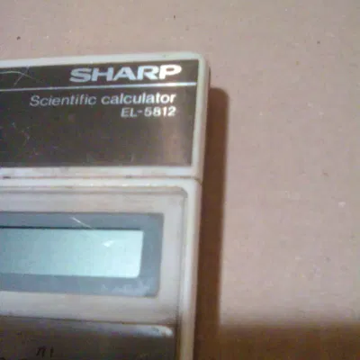 Nắp pin cho máy tính Sharp EL-5812 từ thập niên 70