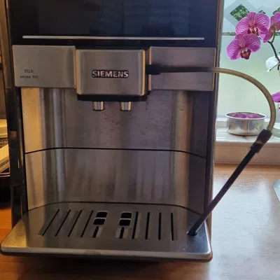 Sửa chữa giá đỡ ống tạo bọt sữa Siemens EQ 6