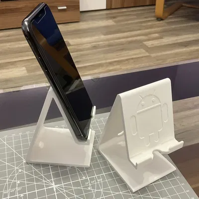 Giá đỡ điện thoại đa dạng kích thước với logo Apple và And...