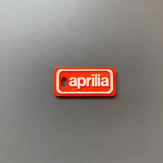 Móc khóa thương hiệu Aprilia in 3D với thiết kế đơn giản - Image 1
