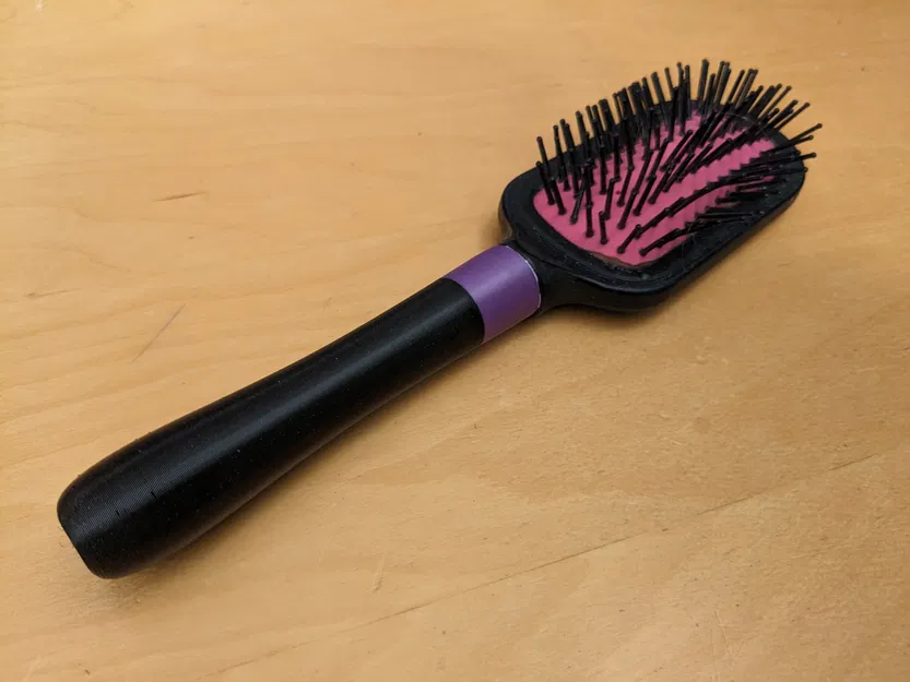 Cán cầm cho bàn chải tóc hỏng - Image 1