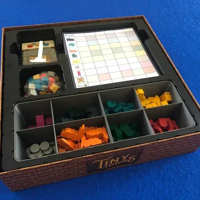 Giá đỡ cho trò chơi Tiny Towns với thiết kế thông minh