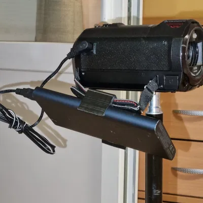 Giá đỡ pin ngoài cho máy quay cầm tay nhỏ