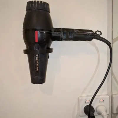 Giá treo máy sấy tóc treo tường