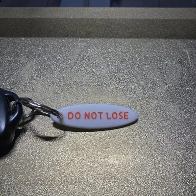 Móc chìa khóa nhắc nhở không được làm mất chìa khóa