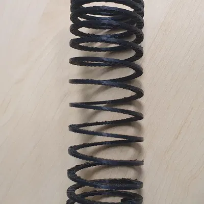 Lò xo nén tròn với bước nhỏ ở hai đầu