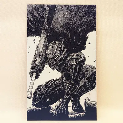 Giáp Berserker Guts với kiếm trong manga Berserk