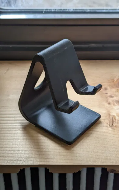 Giá đỡ điện thoại có trọng lượng cho việc sạc và sử dụng - Image 1