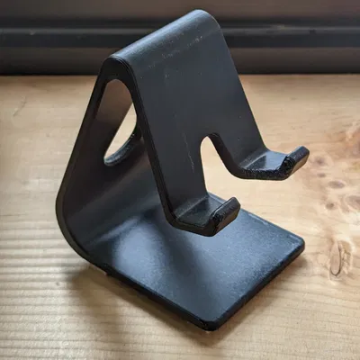 Giá đỡ điện thoại có trọng lượng cho việc sạc và sử dụng