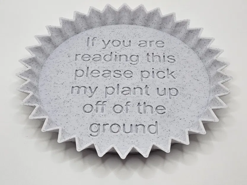 Đế chậu cây có cạnh nhọn và thông điệp thú vị - Image 1