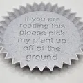 Đế chậu cây có cạnh nhọn và thông điệp thú vị - Thumbnail 1