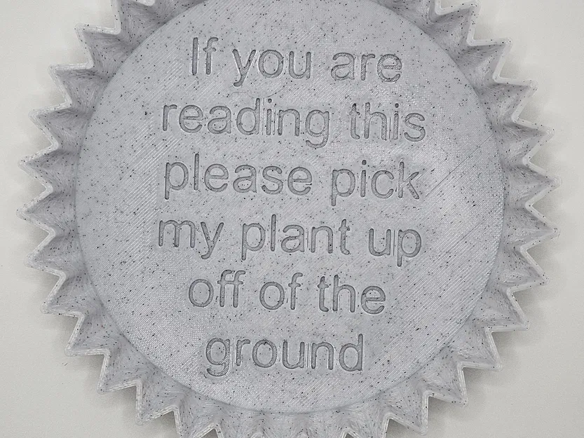 Đế chậu cây có cạnh nhọn và thông điệp thú vị - Image 3