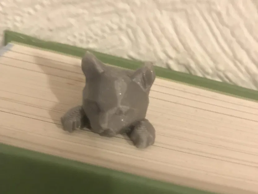 Dấu sách mèo dễ thương nhìn qua trang sách yêu thích của bạn - Image 1