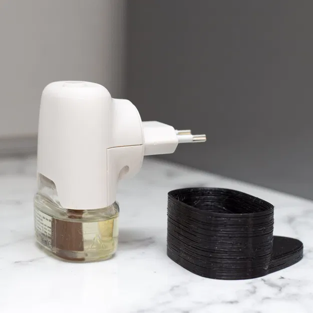 Giá đỡ cho phích điện chống muỗi Raid 36mL - Image 1