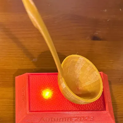 Cúp thìa với đế đèn LED cho cuộc thi nấu ăn