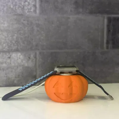 Giá đỡ đồng hồ Apple hình bí ngô Jack O'Lantern