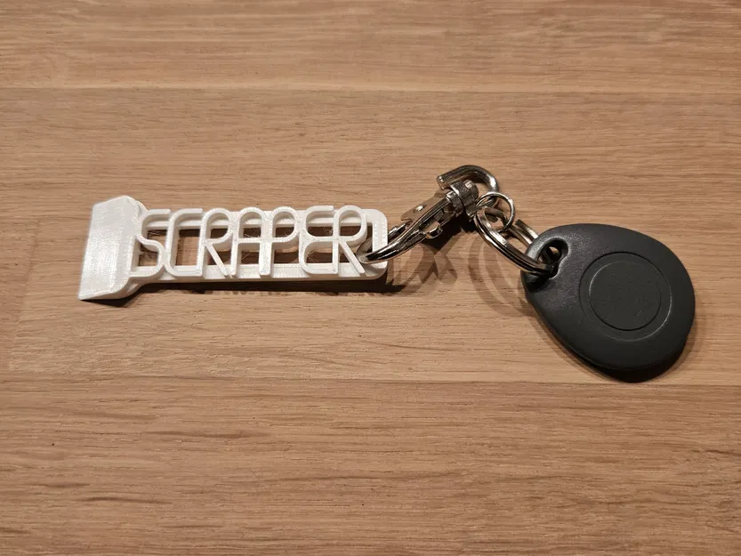 Móc khóa mini với chức năng cạo - Image 1