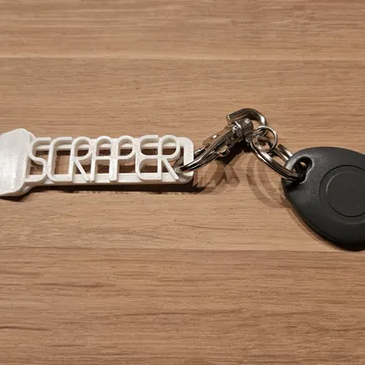 Móc khóa mini với chức năng cạo