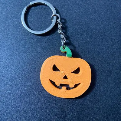 Móc khóa hình bí ngô in 3D hai màu