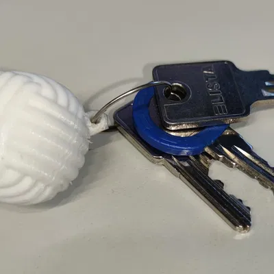 Móc khóa hình nắm đấm khỉ tiện lợi