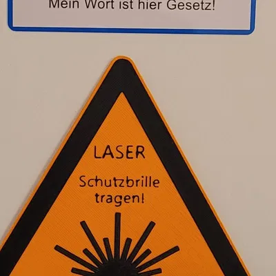 Biểu tượng cảnh báo laser cho cửa xưởng