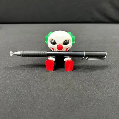 Nhân vật hề đáng yêu giữ bút của bạn