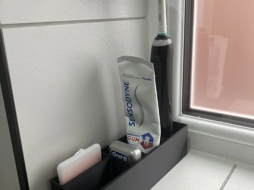 Giá đỡ bàn chải đánh răng điện Oral B và phụ kiện - Image 1