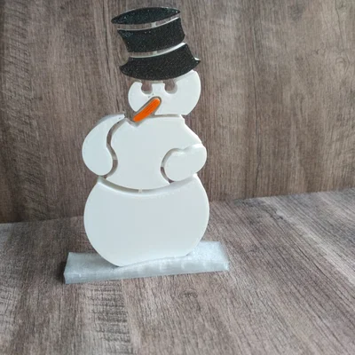 Người tuyết may mắn với giá đỡ