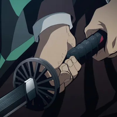 Bảo vệ kiếm Nichirin đầu tiên của Tanjiro (Tsuba)