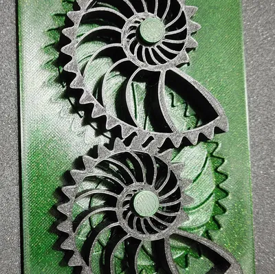 Đồ chơi xoay bánh răng vỏ Nautilus