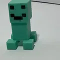 Creeper nhỏ đang mỉm cười từ game Minecraft - Thumbnail 1