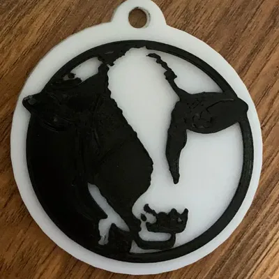 Móc chìa khóa hình con bò với màu sắc thay đổi