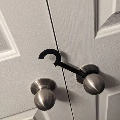 Giá đỡ núm cửa cho cửa tủ đôi